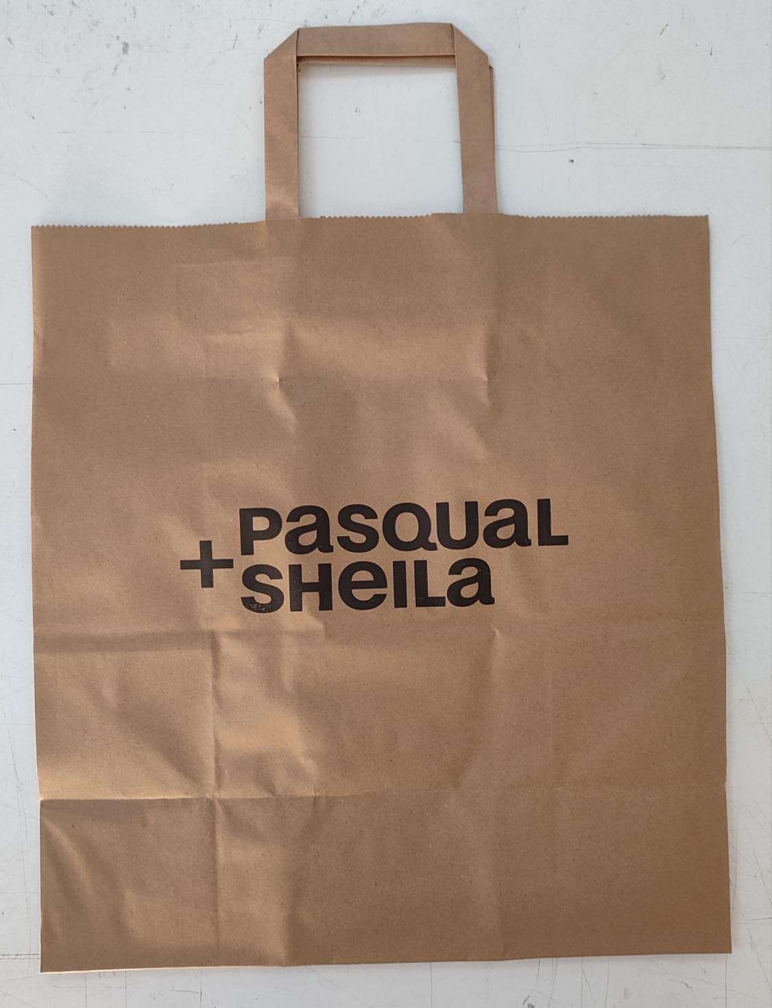 Bolsa Kraft Asa Plana XS (22+10x29cm) (personalizada a 1 tinta- a 2 caras)- 1500 unidades
